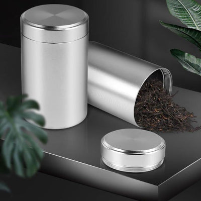 boite a the design argentée préserve la fraîcheur du thé noir