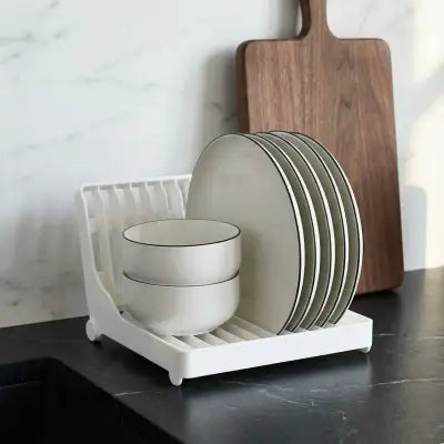 petit egouttoir vaisselle support pliable facile à ranger dans un tiroir