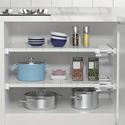 rangement sous evier télescopique offrant accès facile aux produits grâce au système extensible